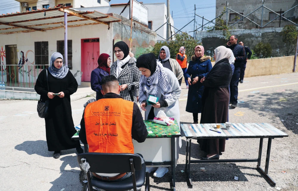 Polls opened in the Israeli-occupied West Bank on Saturday in a rare democratic exercise following a decade and a half of delays to Palestinian elections. (AFP)