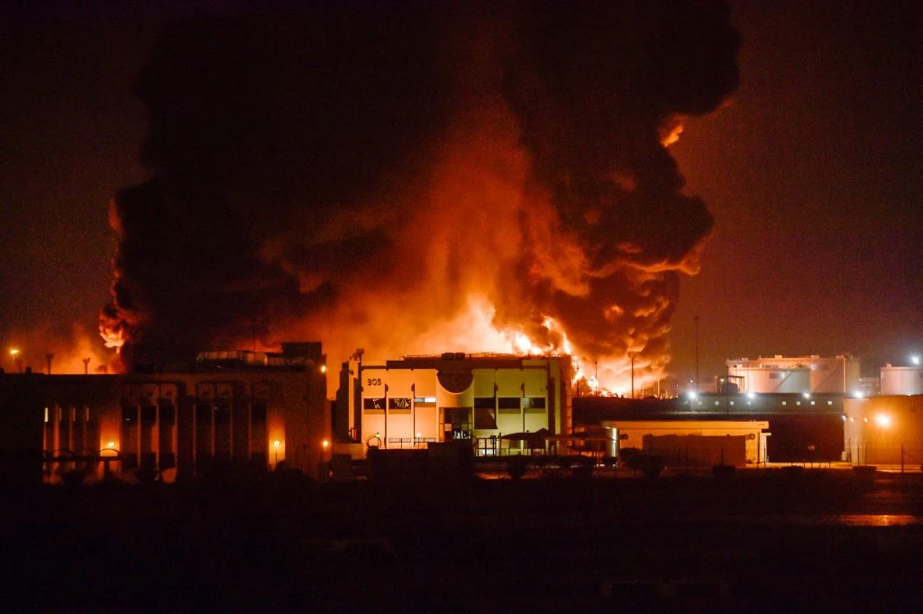 A huge fire erupted at an Aramco oil storage facility in Jeddah after a Houthi attack. (AFP)
