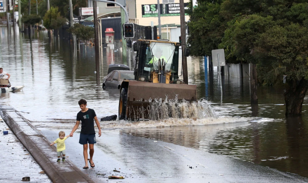 A view of a flooded road following heavy rains in Lismore, New South Wales, Australia. (Reuters)