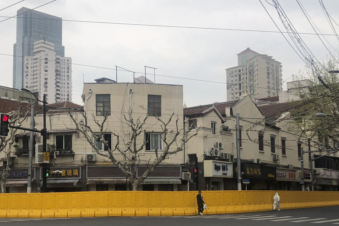 Shanghai is being locked down by splitting the city into two roughly along the Huangpu River, dividing the historic center west of the river from the eastern financial and industrial district of Pudong. (AP)