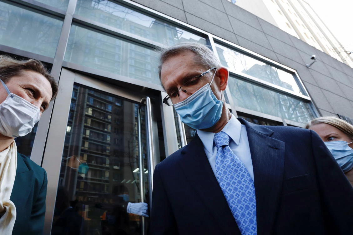 Australian journalist tried behind closed doors in Beijing court