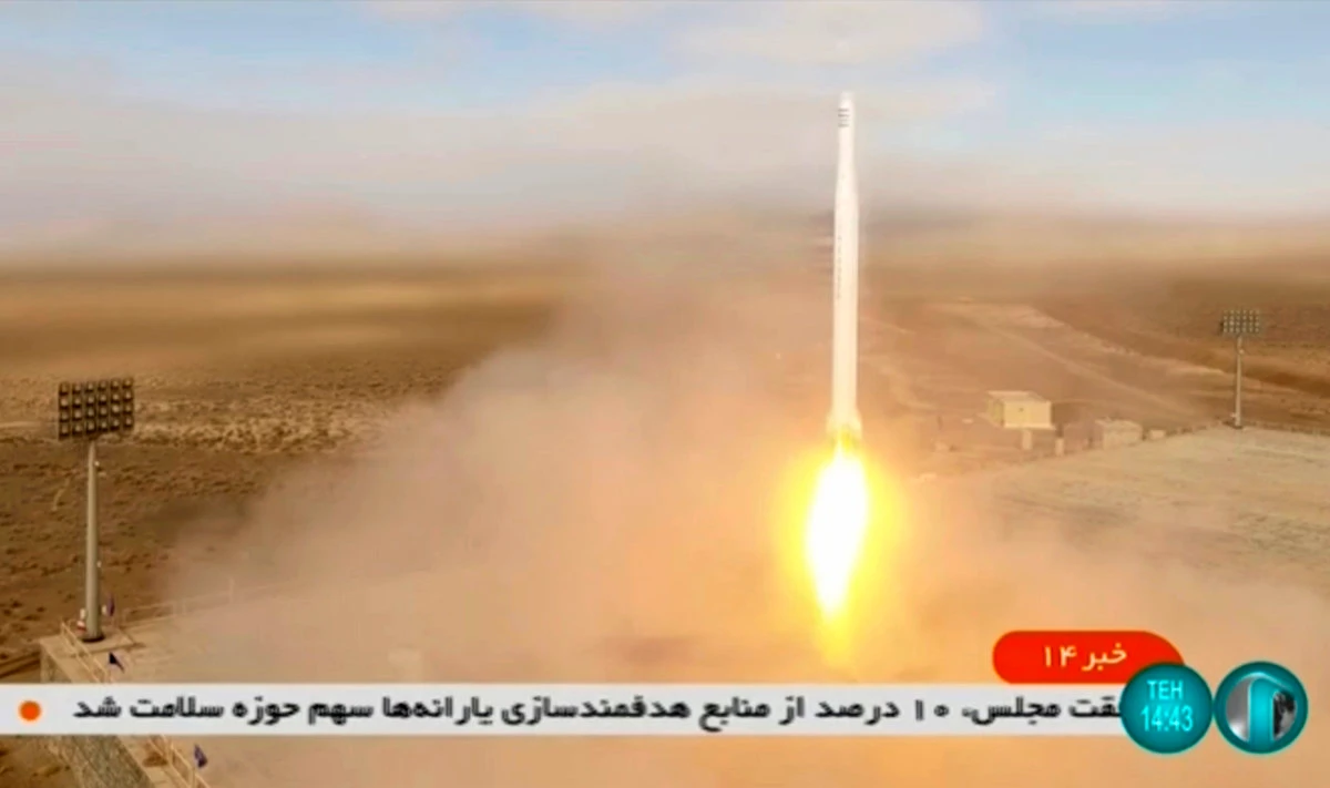 This image taken from video footage aired by Iranian state TV on March 8, 2022, shows the launch of a rocket by Iran's Revolutionary Guard carrying a Noor-2 satellite in northeastern Shahroud Desert. (Iran state Tv via AFP)