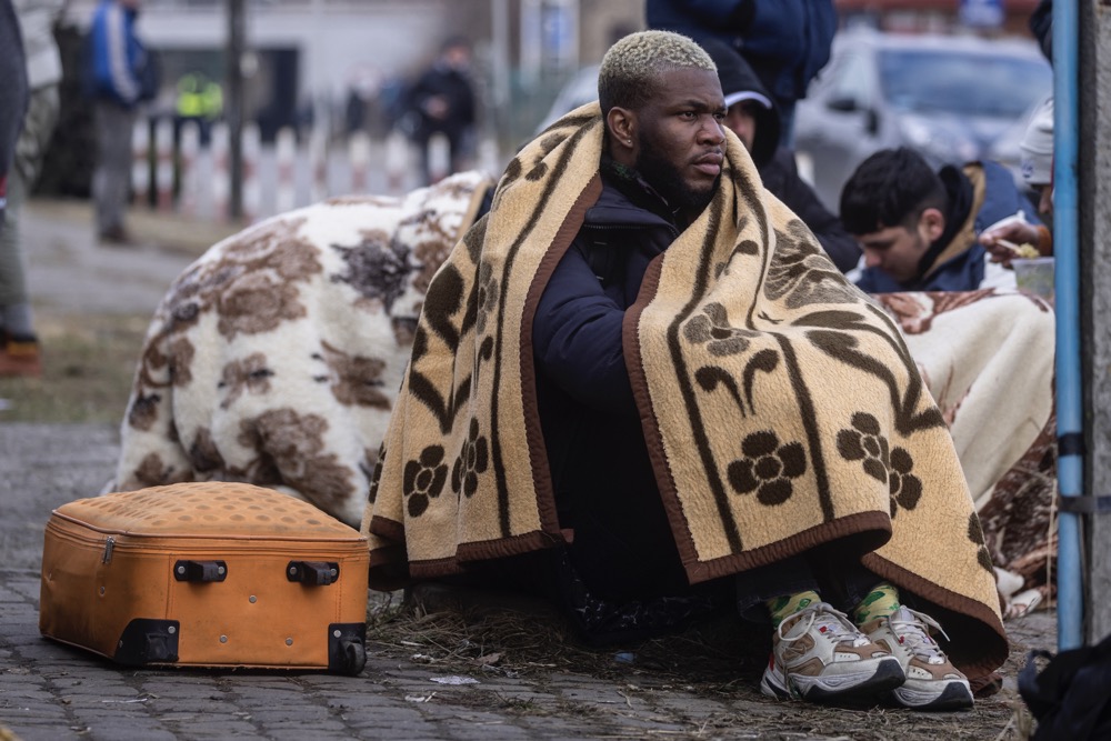 Refugees from many different countries at the Medyka pedestrian border crossing in Poland fleeing the conflict in Ukraine. (AFP)