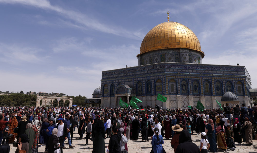 Palestinians protest at the compound that houses Al-Aqsa Mosque, known to Muslims as the Noble Sanctuary and to Jews as the Temple Mount, in Jerusalem's Old City. (Reuters)