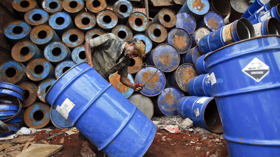Empty drum containers at a recycling workshop in Mumbai, India. (Reuters)