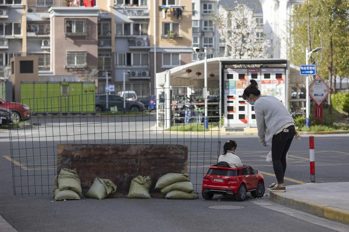 Stories of separated children are angering residents and raising questions about the costs of Beijing’s ‘dynamic clearance’ policy to fight the spread of the disease. (AP)