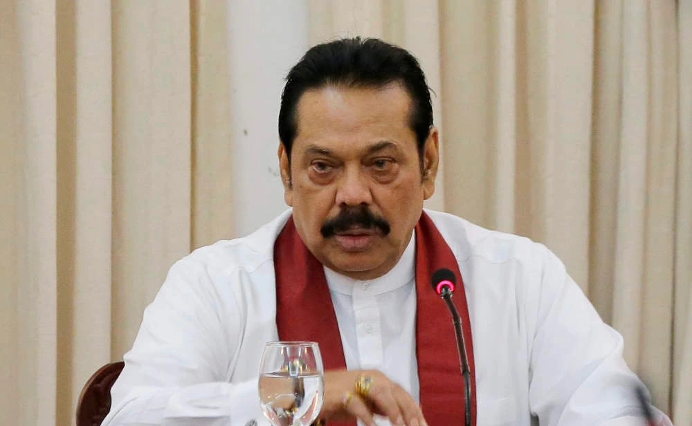 Sri Lanka cabinet resigns after protesters defy curfew