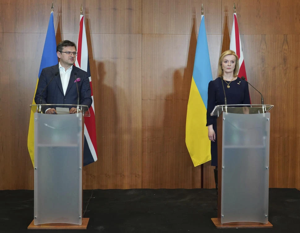 British Foreign Secretary Liz Truss and Ukrainian Foreign Minister Dmytro Kuleba give a press statement at the British Embassy in Warsaw on Monday. (AP)