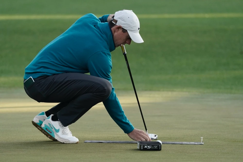 Rory McIlroy, of Northern Ireland practices his putting during a practice round for the Masters golf tournament on Tuesday, April 5, 2022, in Augusta, Ga. (AP)