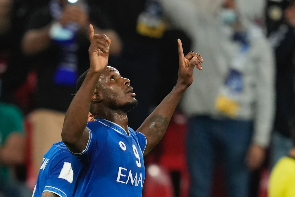 Al Hilal's Odion Ighalo celebrates after scoring his side's opening goal during the Club World Cup soccer match between Al Jazira and Al Hilal in Abu Dhabi, United Arab Emirates on Feb. 6, 2022. (AFP)