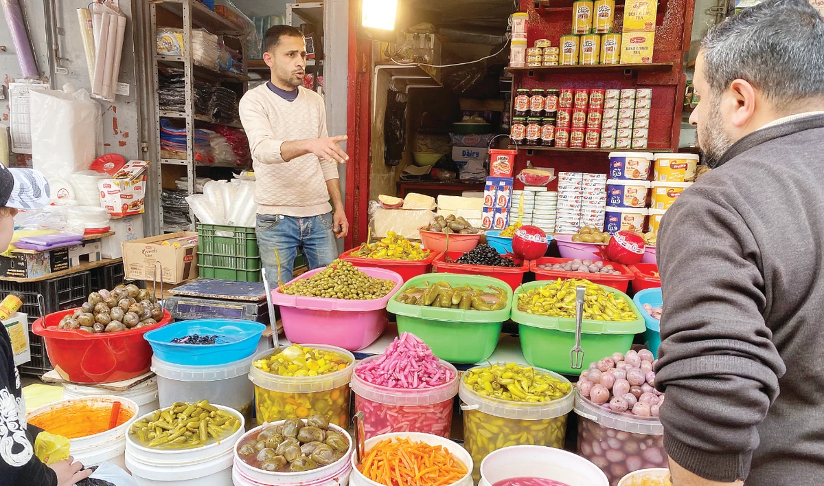 Pickle trade flourishes during the month of Ramadan and business owners hire extra workers to help them meet the demand. (Supplied)