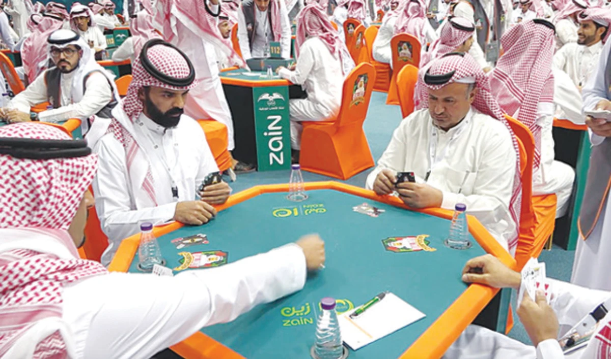 Baloot is a popular game played by families and friends in the Kingdom. (File photo)