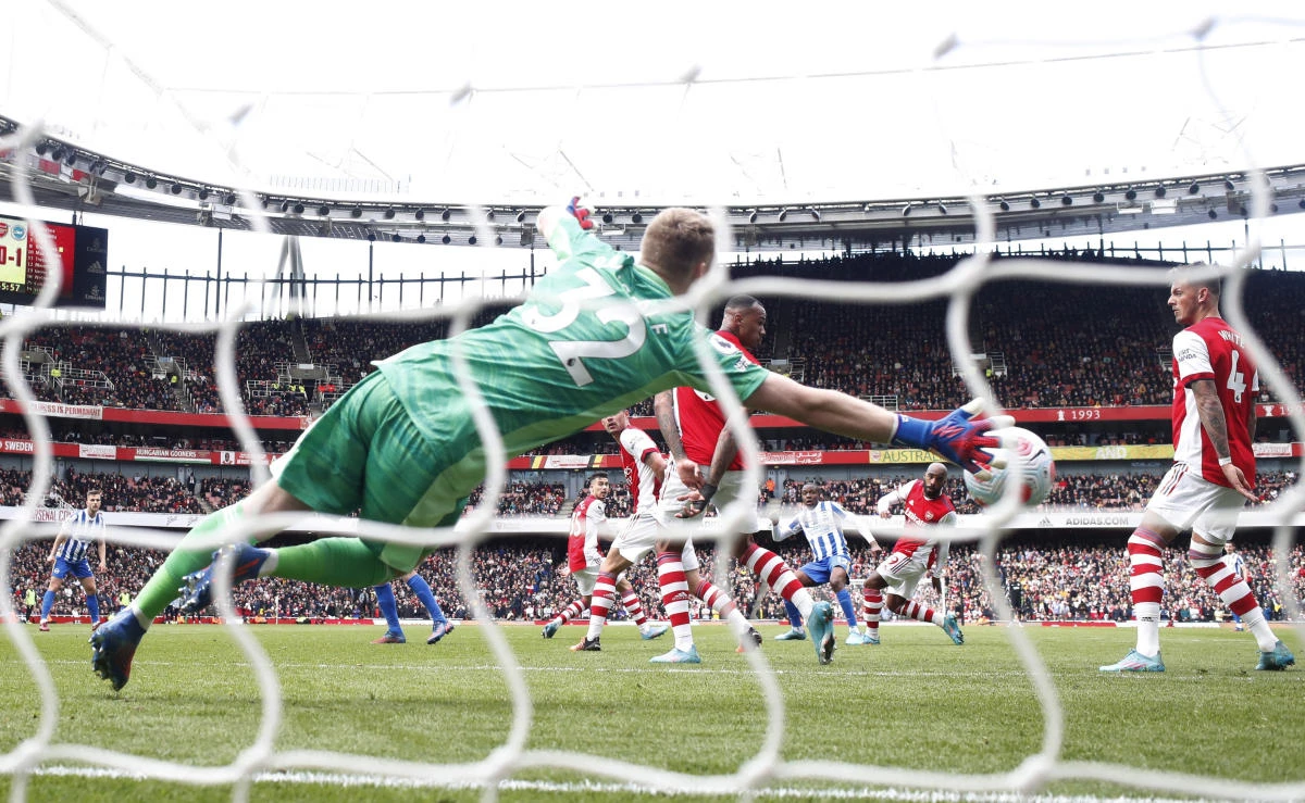 Brighton & Hove Albion’s Enock Mwepu scores their second goal past Arsenal’s Aaron Ramsdale during their Premier League match at Emirates Stadium on Saturday. (Reuters)