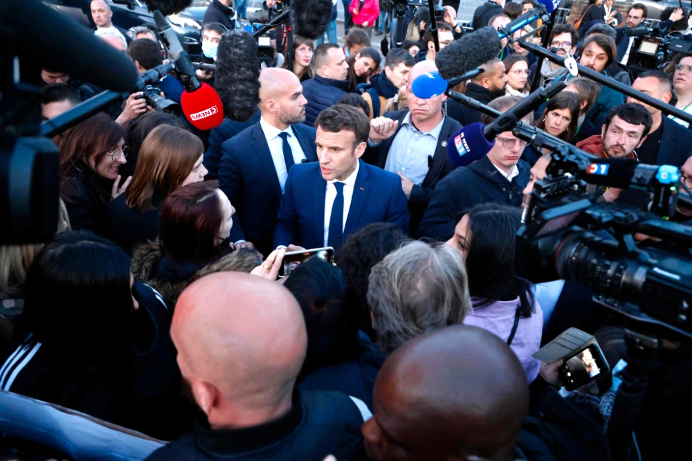 Macron is expected to target Marine Le Pen’s past admiration for Russian leader Vladimir Putin. (AFP)