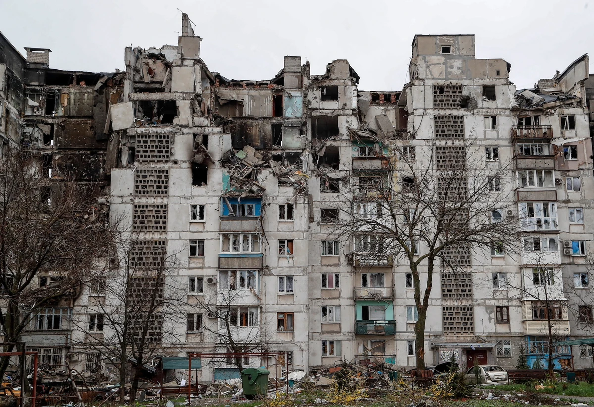 A view shows a residential building damaged in the course of Ukraine-Russia conflict in the southern port city of Mariupol, Ukraine April 13, 2022. (Reuters)