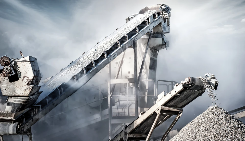 Stock image. Cement production factory on mining quarry. Shutterstock.
