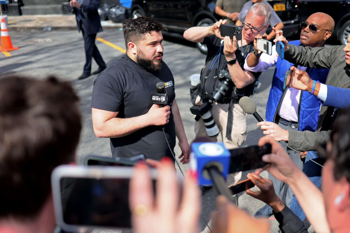 Zack Tahhan gives an interview after leaving the 9th Precinct to positively identify Frank James as the gunman in the Brooklyn subway shooting on April 13, 2022 in New York City. (AFP)