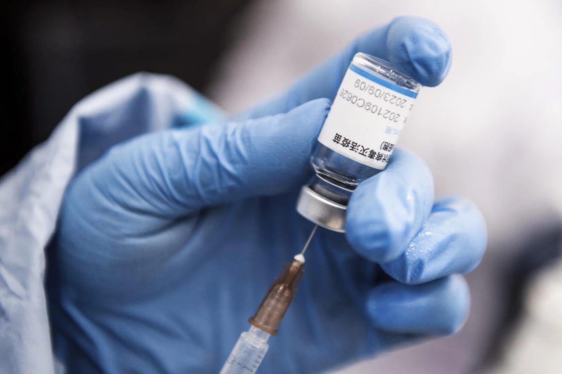 Scientists worldwide are racing to study upgraded injections against omicron. (File/AFP)