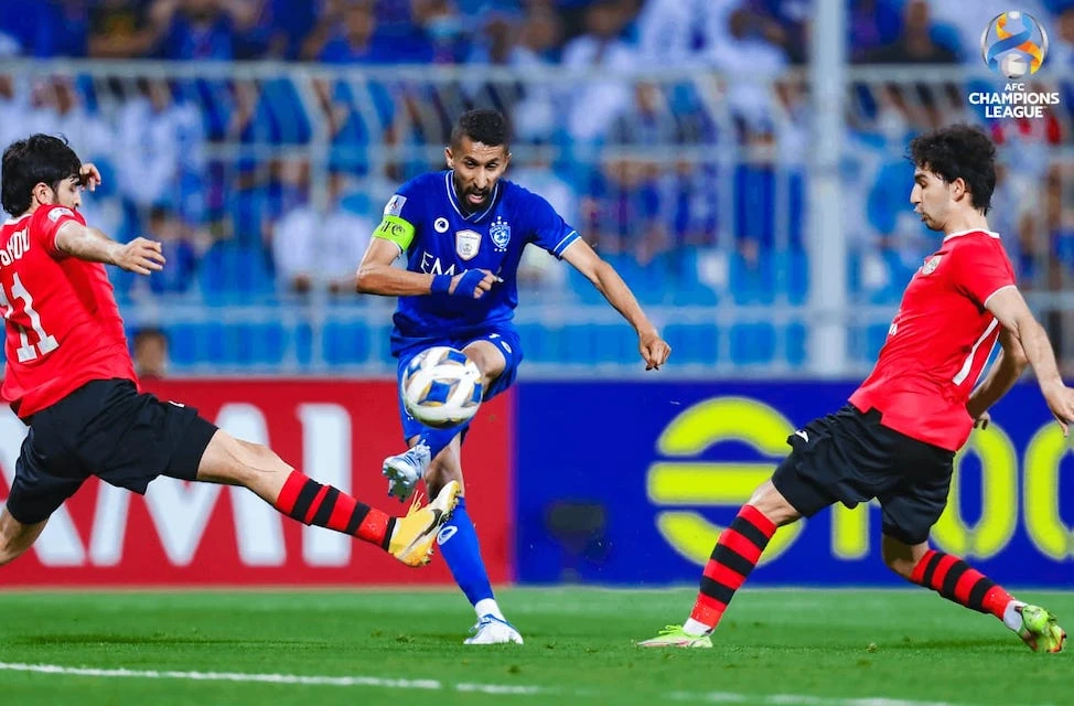 Al-Hilal captain Salman Al-Faraj shoots on goal during the AFC Champions League Group A football match against Istiklol on Friday. (Twitter: @Alhilal_EN)