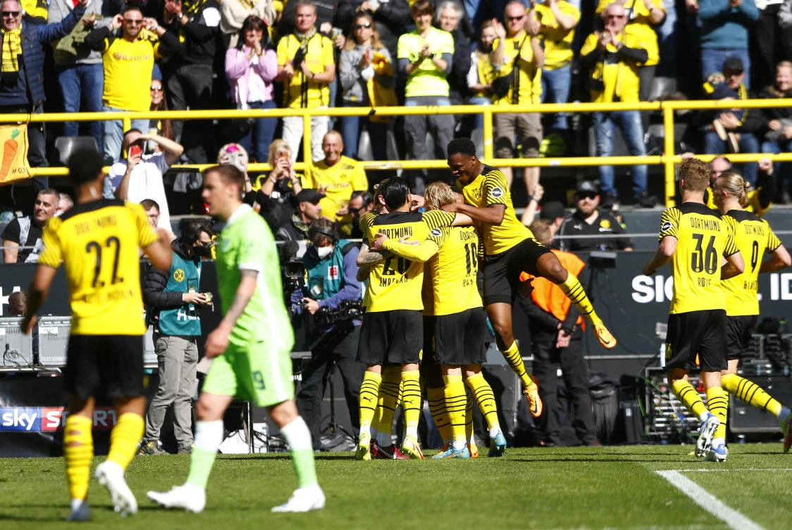 Borussia Dortmund’s Manuel Akanji celebrates scoring their third goal with teammates in their Bundesliga match against VfL Wolfsburg at Signal Iduna Park, Dortmund on Saturday. (Reuters)