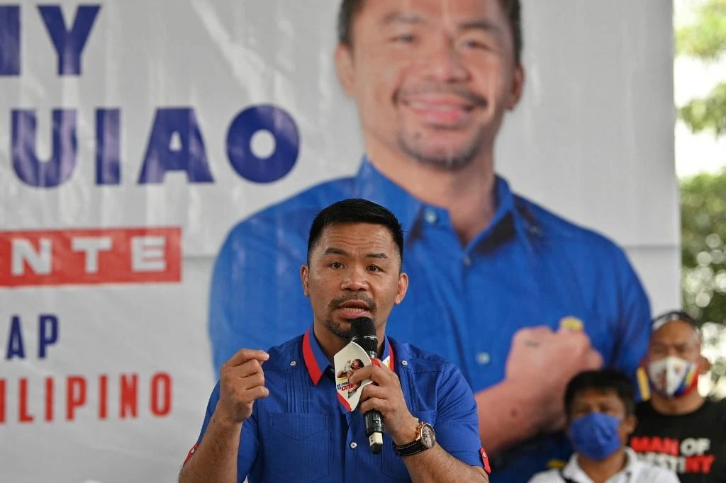 All four candidates are trailing in opinion polls in the run up to the May 9 election, including retired boxing star Manny Pacquiao. (AFP)
