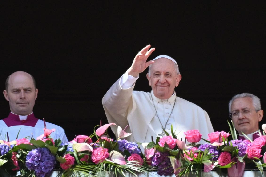 Pope Francis delivers the Easter "Urbi et Orbi" blessing from the balcony of St. Peter's Basilica overlooking St. Peter's square on April 17, 2022 in The Vatican. (AFP)