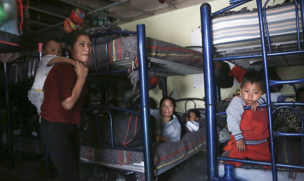 The number of migrants attempting to cross the US-Mexico border has surged in recent weeks as the US prepares for even larger numbers with the expected lifting of a pandemic-era order that turned away asylum seekers. (AP/File)