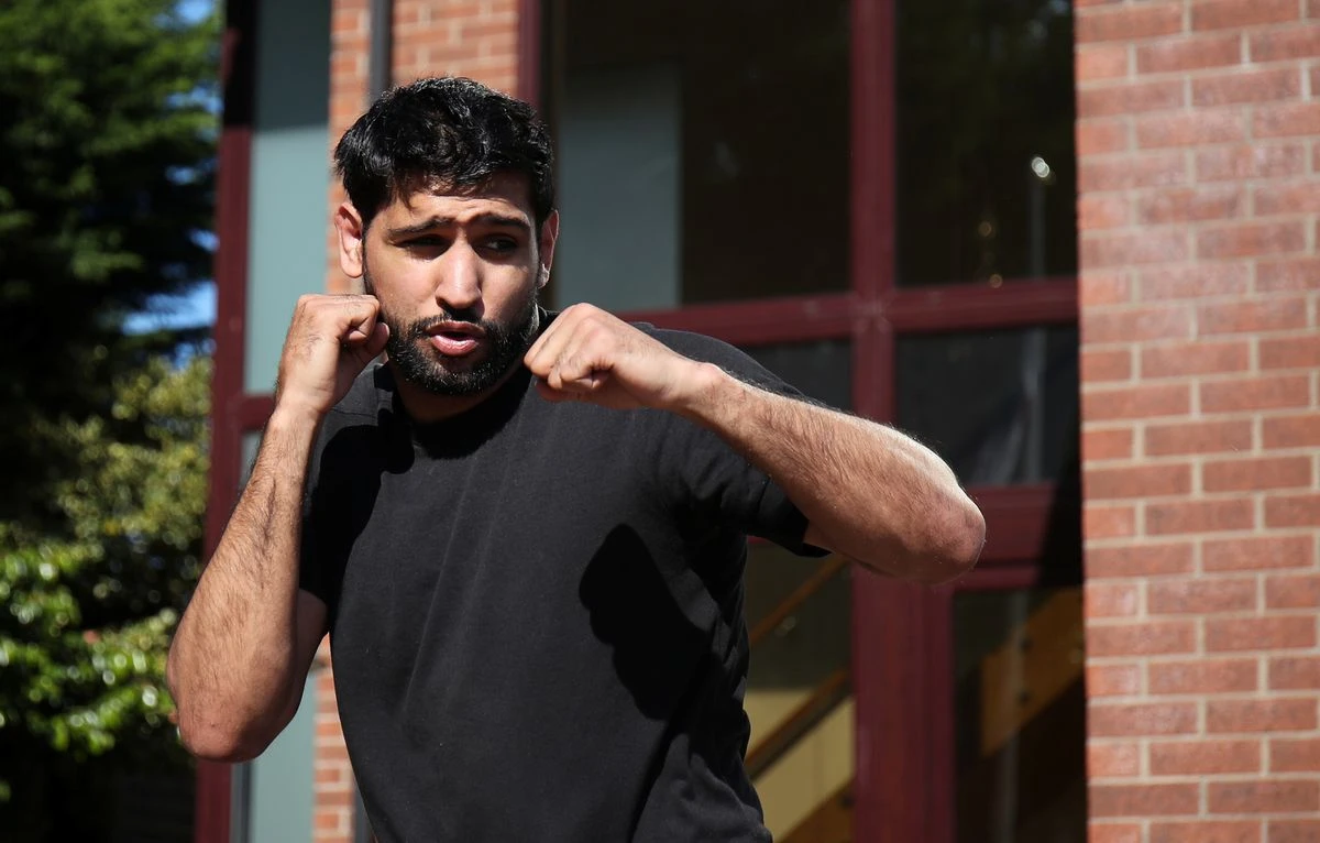 Boxer Amir Khan trains at his home in Bolton, following the outbreak of the coronavirus disease (COVID-19), Bolton, Britain, May 20, 2020. (Reuters)