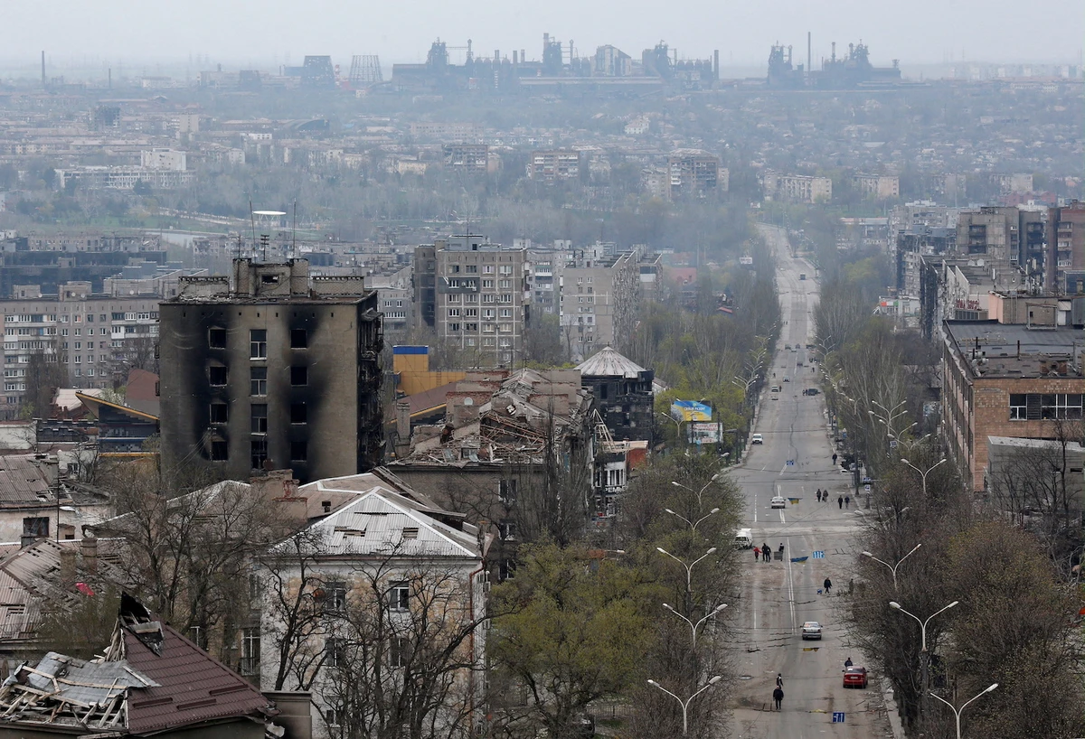 A view shows damaged buildings, with the Azovstal Iron and Steel Works plant in the background, in the southern port city of Mariupol, Ukraine April 19, 2022. (Reuters)
