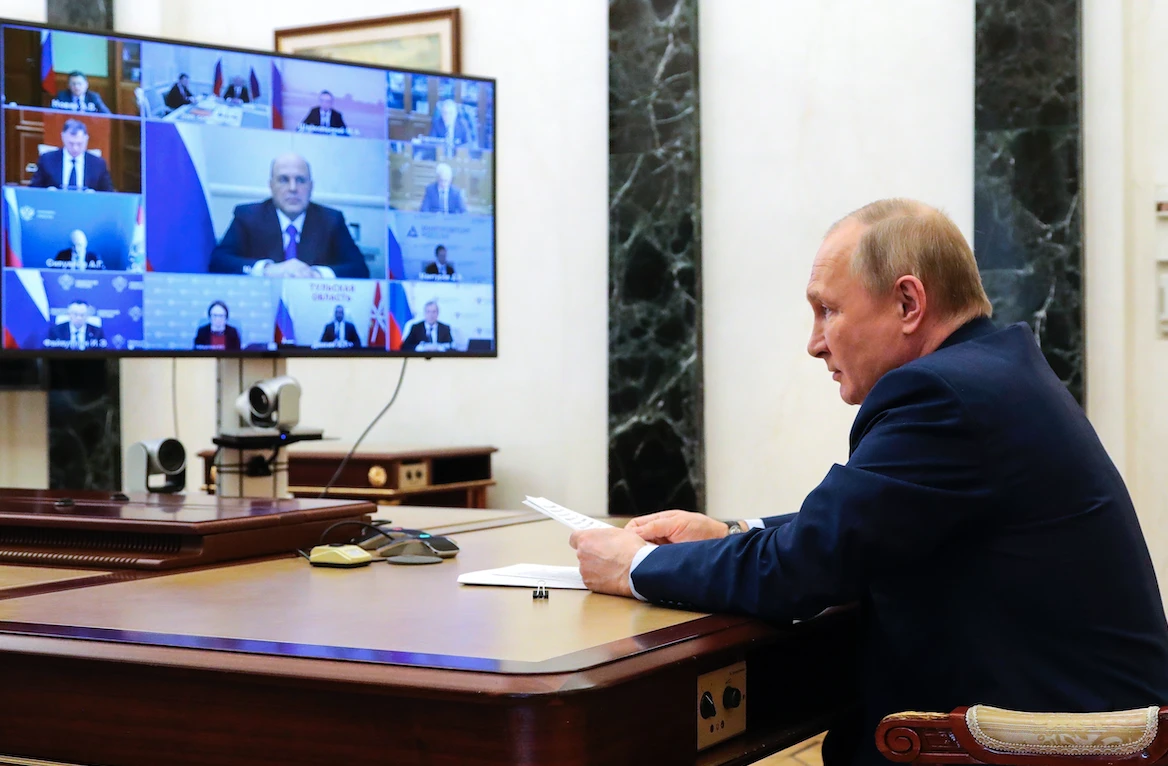 Russian President Vladimir Putin attends a meeting on the current situation in Russia's iron and steel industry via videoconference in the Kremlin in Moscow, Russia, Wednesday, April 20, 2022. (Kremlin Pool Photo via AP)