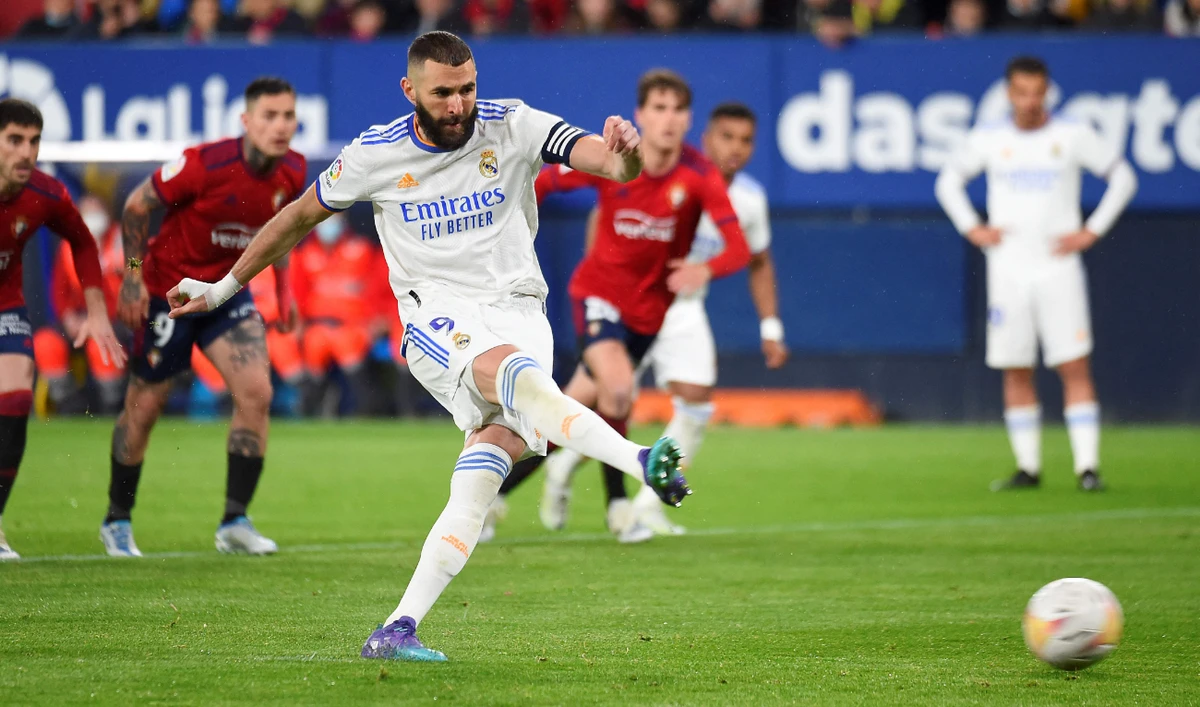 Real Madrid's French forward Karim Benzema takes a penalty kick — and misses — during their Spanish League football match against CA Osasuna on April 20, 2022. (AFP)