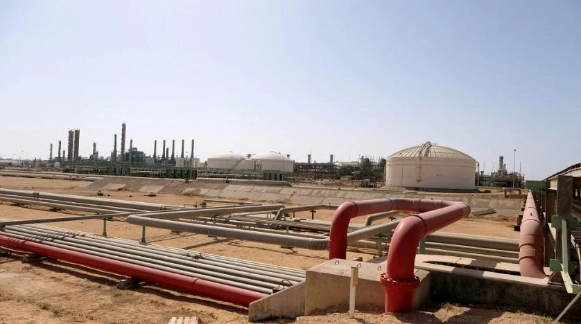Recent political instability has reduced oil production in the North African country by an estimated 400,000 barrels per day, around a 50 percent decline in daily production. File