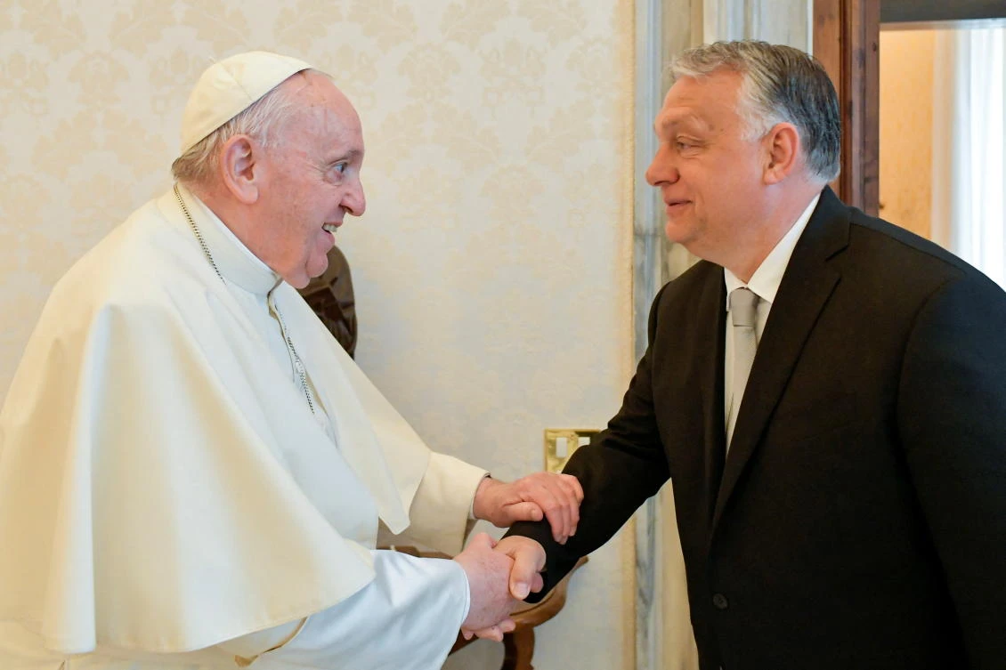 Pope Francis shakes hands with Hungarian Prime Minister Viktor Orban during a private audience at the Vatican on Thursday. (Reuters)