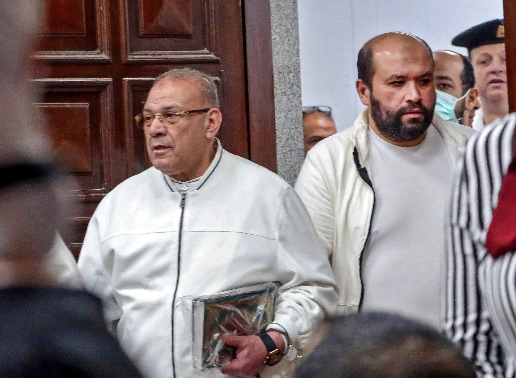 Egyptian businessman Hassan Rateb arrives to court for the verdict announcement session in his trial alongside others on charges of illegal excavation and trafficking of antiquities, in Cairo on Thursday. (AFP)