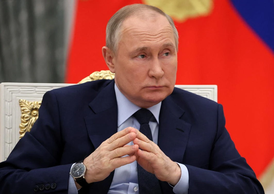 The fresh round of sanctions also targets 144 Russian senators who provided support to President Vladimir Putin. (Sputnik via Reuters)