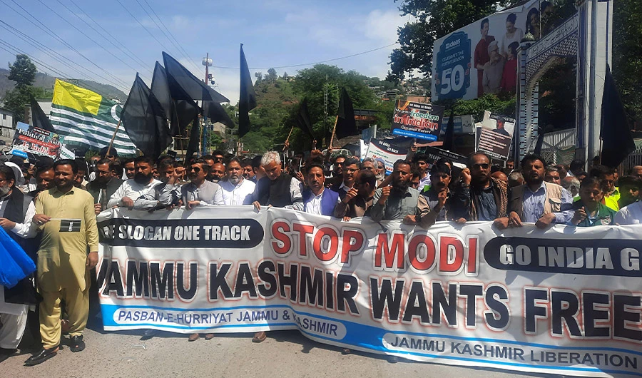 Pakistani Kashmiri protestors take part in a demonstration in Muzaffarabad on April 24, 2022, against the visit of India's Prime Minister Narendra Modi to the Jammu and Kashmir. (AFP)