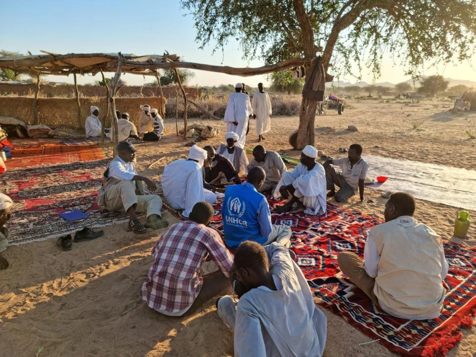 In this photo taken in 2021, UNHCR staff assess the needs of people displaced by inter-communal violence in Jebel Moon, West Darfur. (UNHCR photo)