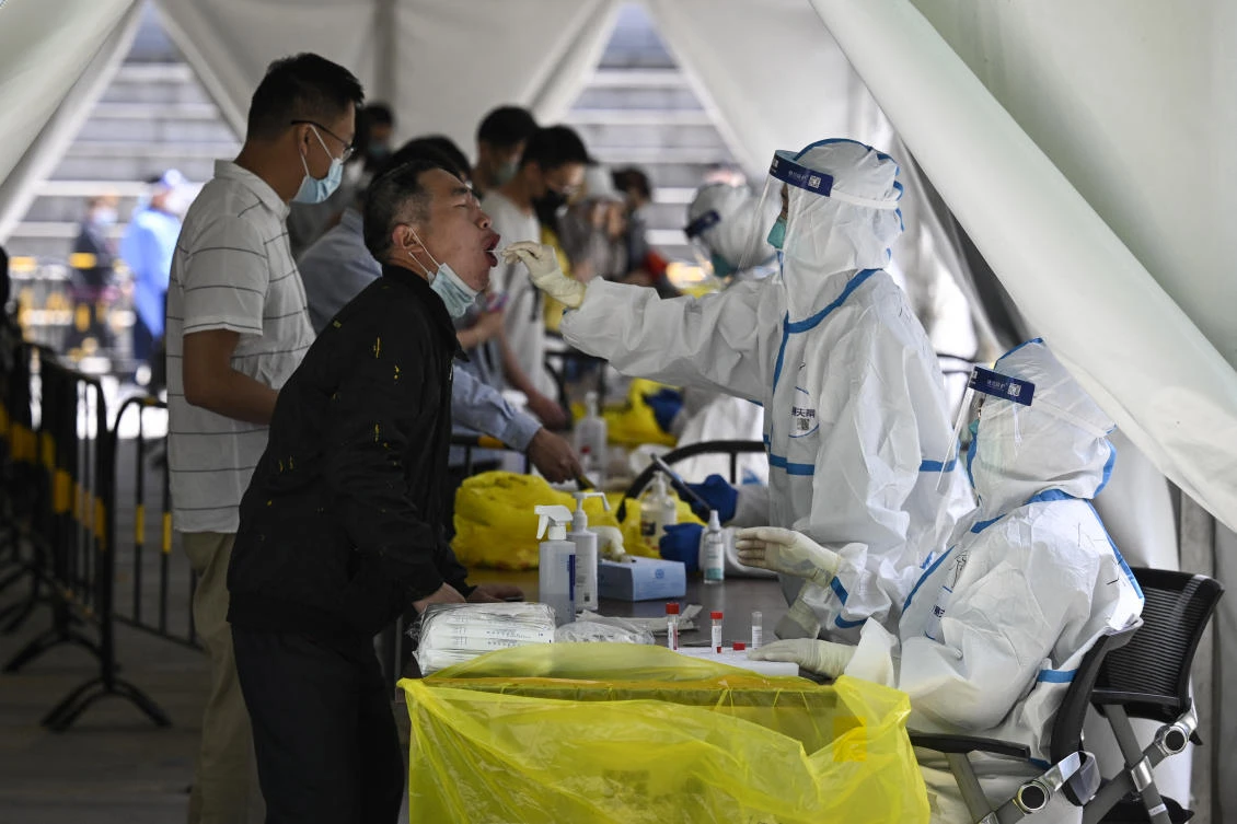 Beijing enforces mass COVID-19 testing, closes neighborhoods