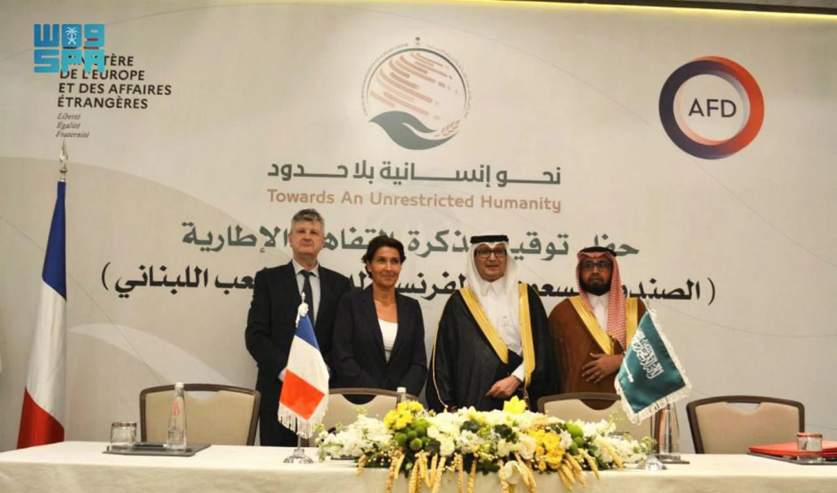 Saudi and French officials join a photo session during the signing of the agreement in Beirut. (SPA)