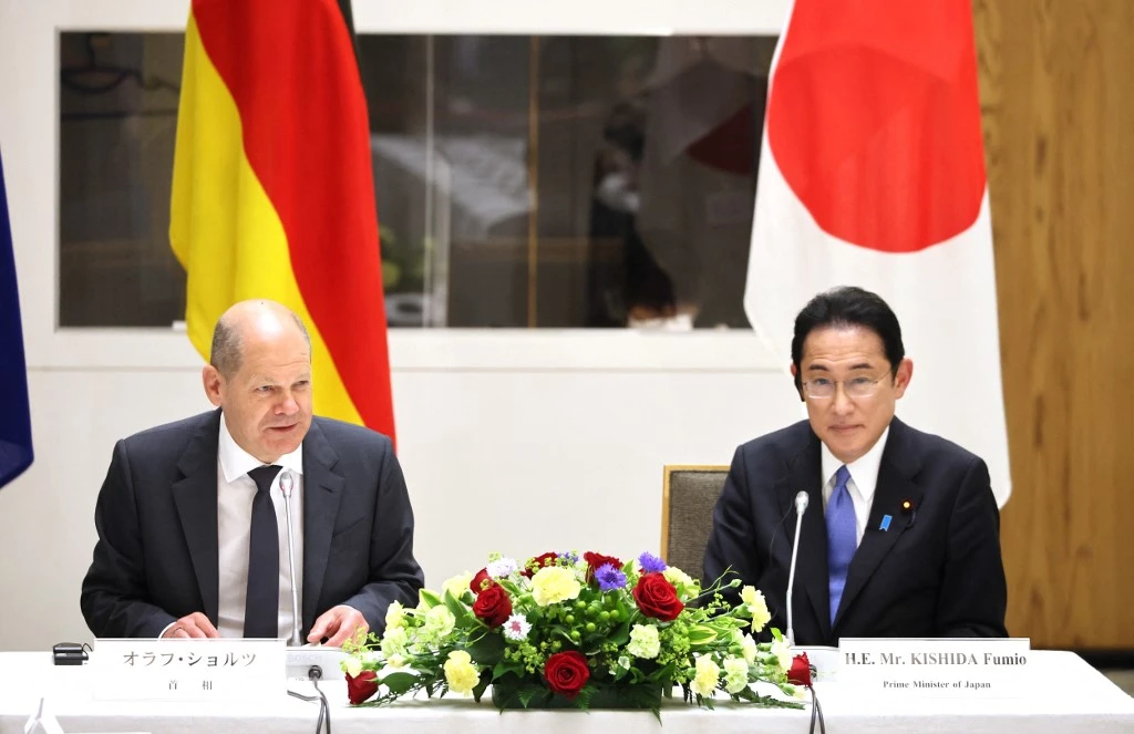 German Chancellor Olaf Scholz (L) said the Japan-Germany collaboration will help address common issues. (AFP)