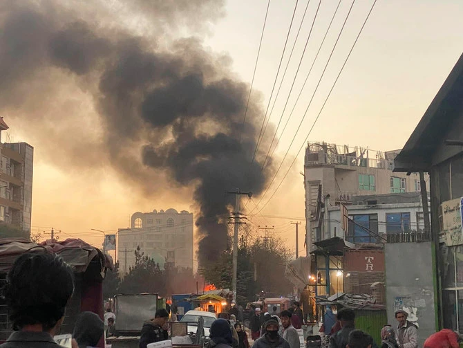 Smoke rises following a bomb explosion in November 2021 in Kabul, Afghanistan where police said 2 bomb blasts on separate minibuses killed over 9 people on Thursday in Mazar-i-Sharif. (AP)