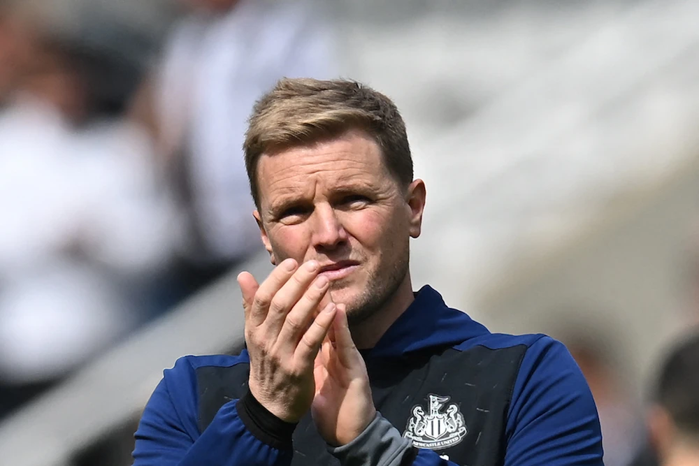 Head coach Eddie Howe applauds at the end of the English Premier League football match between his Newcastle United side and Liverpool. (AFP)