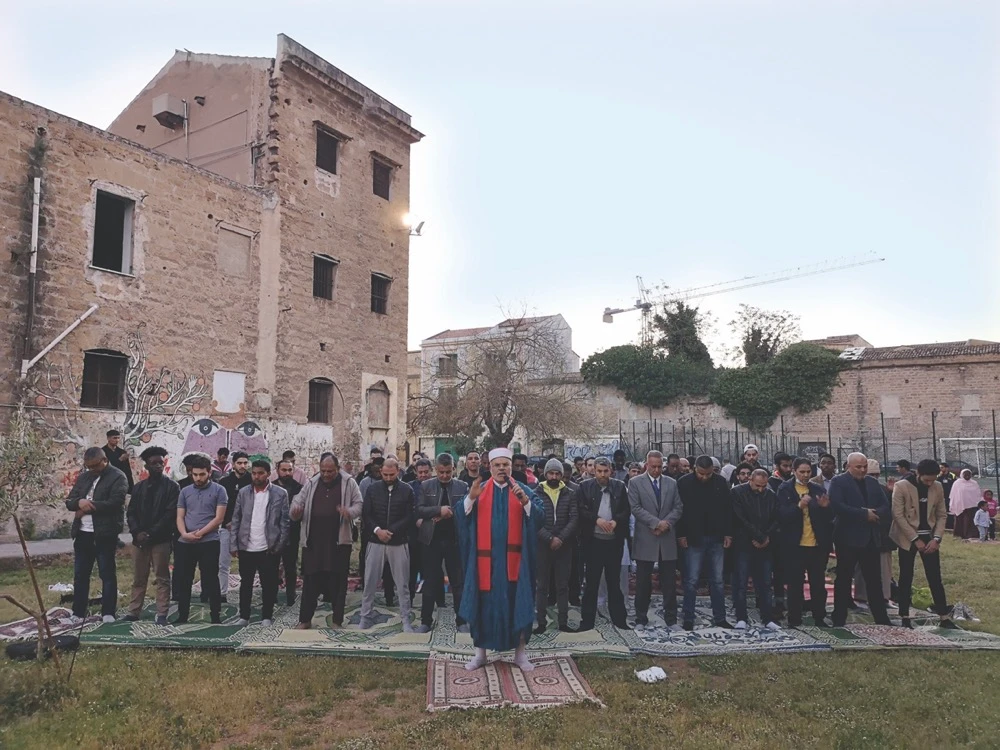 The faithful — mostly Tunisians, Moroccans and Bangladeshis — had their prayer in Piazza Magione, a large and iconic square in the city. (Supplied)