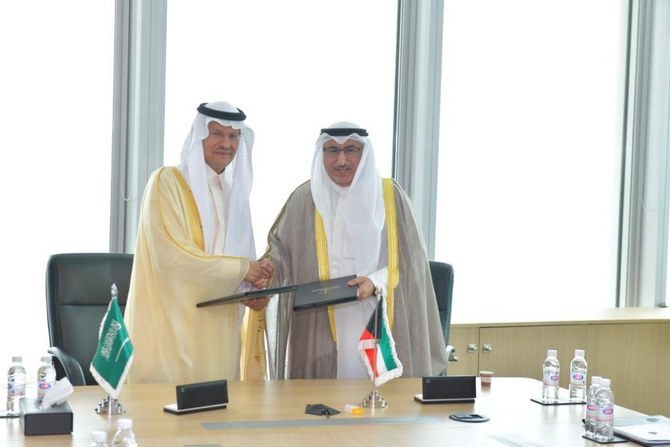 Saudi Energy Minister Prince Abdulaziz bin Salman with his Kuwaiti counterpart Mohammed Al-Fares. (Supplied)