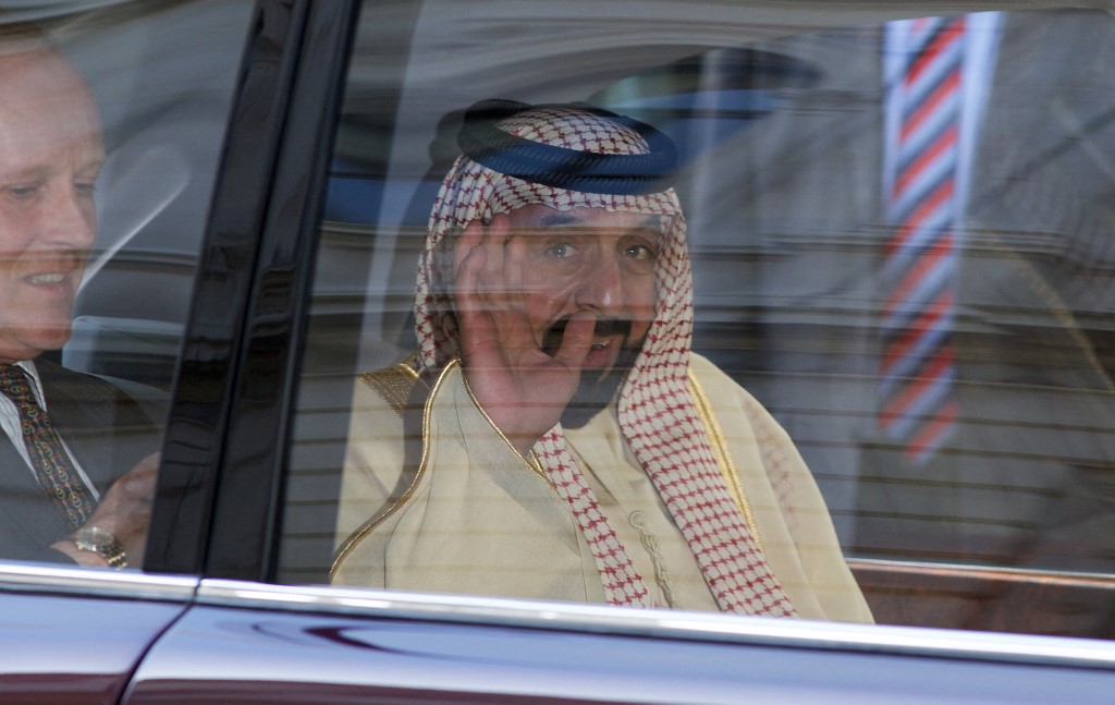 Sheikh Khalifa bin Zayed waves from his vehicle as he leaves 10 Downing Street in Central London. (AFP)