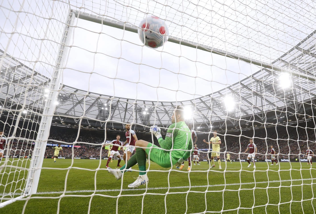 Arsenal’s Gabriel scores their second goal past West Ham United’s Lukasz Fabianski. (Action Images via Reuters)