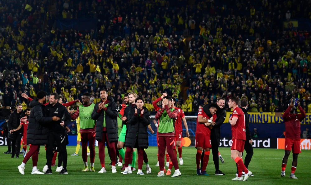 Liverpool players celebrate after their Champions League semifinal second leg football match against Villarreal at the Ceramica stadium in Villarreal, Spain, Tuesday. (AP)