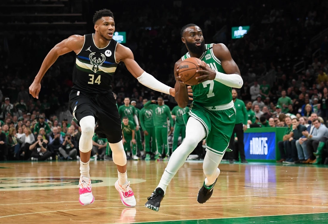 Boston Celtics guard Jaylen Brown drives to the basket past Milwaukee Bucks forward Giannis Antetokounmpo in the first half during Game 2 of the second round for the 2022 NBA playoffs at TD Garden. (USA TODAY Sports)
