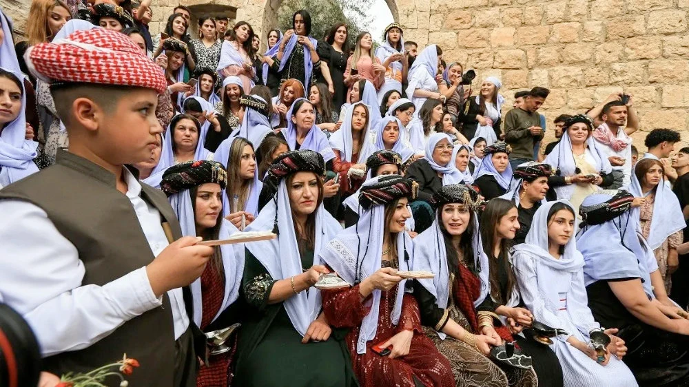 Iraqi Yazidis attend a ceremony to celebrate their New Year at Lalish temple in Shekhan district, Duhok province, Iraq, on April 19. (Reuters)