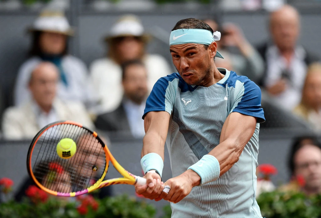 Spain's Rafael Nadal in action against Serbia's Miomir Kecmanovic during their 2022 ATP Tour Madrid Open tennis tournament singles match at the Caja Magica in Madrid on May 4, 2022. (AFP)